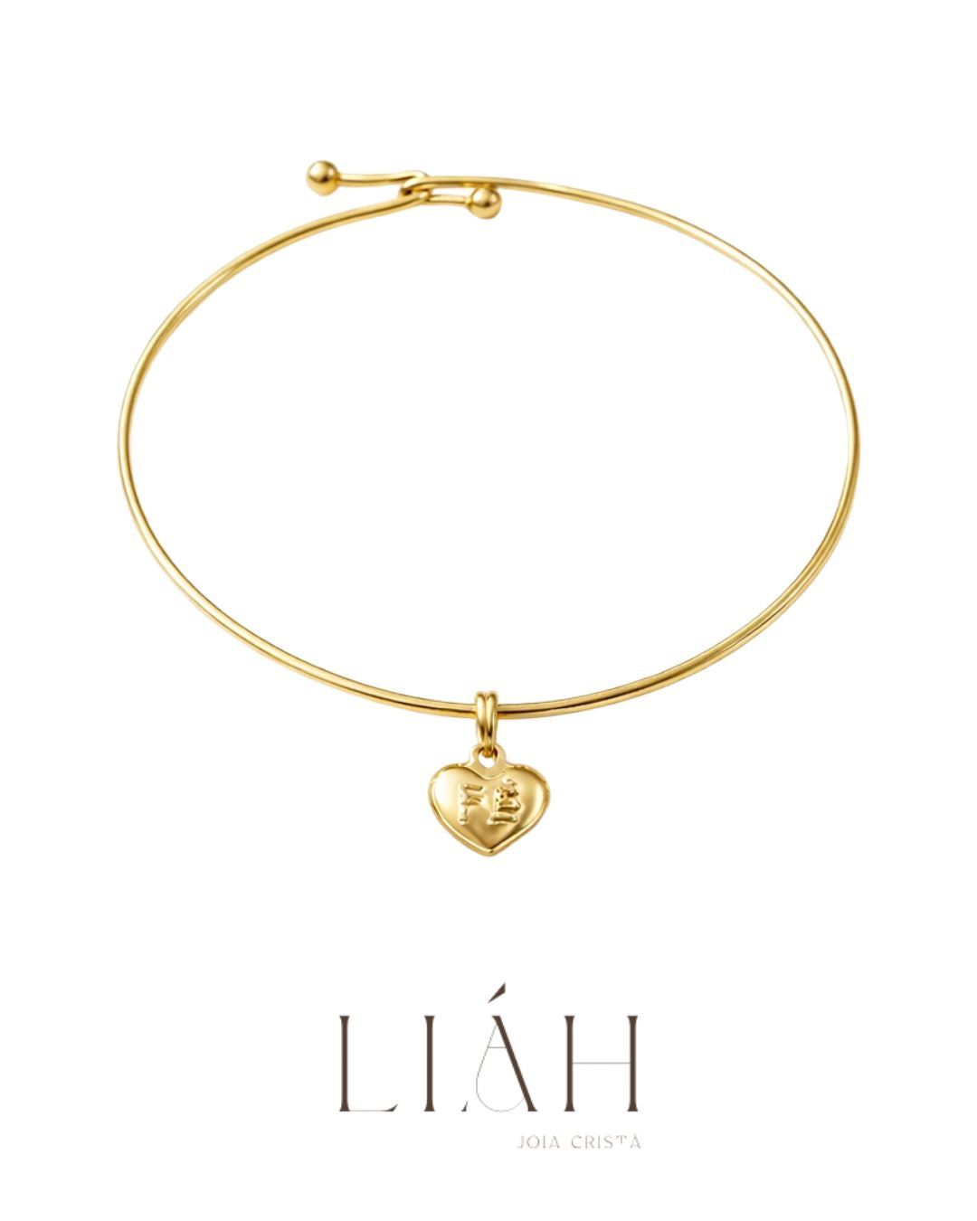 Pulseira Fé semijoia banhada a ouro com pingente coração gravado e aro delicado – Liáh Joia Cristã
