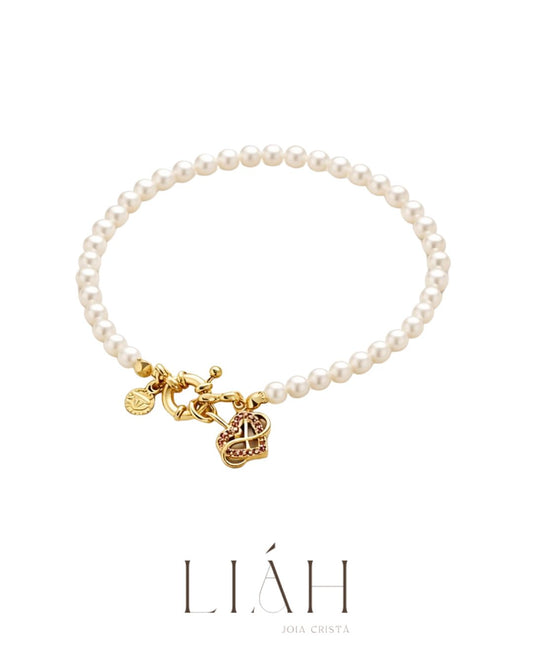 Pulseira feminina de pérolas com fecho dourado e pingente coração com pedras rosas, semijoia banhada a ouro – Liah Joia Cristã